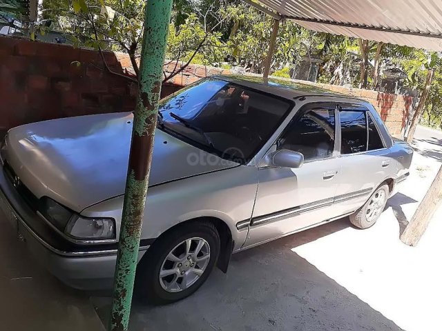 Bán xe Mazda 323 đời 1995, màu bạc, nhập khẩu chính chủ0