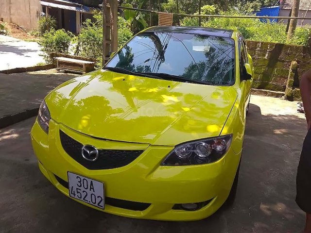 Cần bán xe Mazda 3 1.6 AT 2005, màu vàng như mới