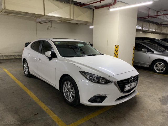 Cần bán Mazda 3 đời 2016, màu trắng0