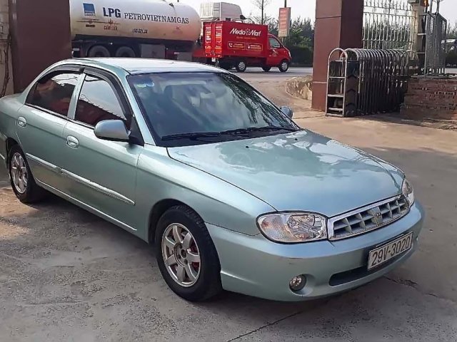 Cần bán Kia Spectra năm 2003, màu xanh lam, xe nhập, 115 triệu0