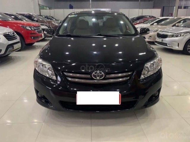 Bán xe Toyota Corolla Altis 1.8G AT đời 2010, màu đen, số tự động0