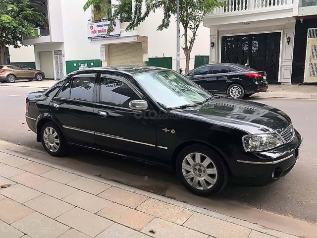 Bán Ford Laser GHIA 1.8 AT sản xuất 2004, màu đen, số tự động 0