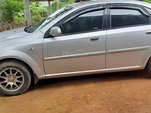 Bán ô tô Daewoo Lacetti EX 1.6 MT năm sản xuất 2004, màu bạc0