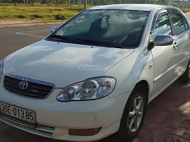 Bán Toyota Corolla Altis 1.8G MT đời 2002, màu trắng, giá tốt0