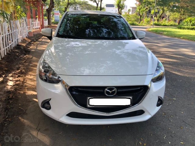 Cần bán xe Mazda 2 năm sản xuất 2017, màu trắng, đi 11.500km, giá chỉ 478tr