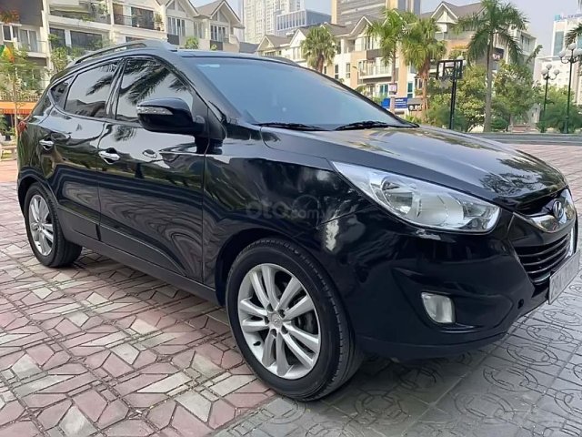 Cần bán gấp Hyundai Tucson 2.0 AT 4WD sản xuất 2011, màu đen 