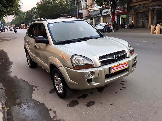 Bán xe Hyundai Tucson 2.0 AT năm sản xuất 2009, màu vàng, nhập khẩu nguyên chiếc 