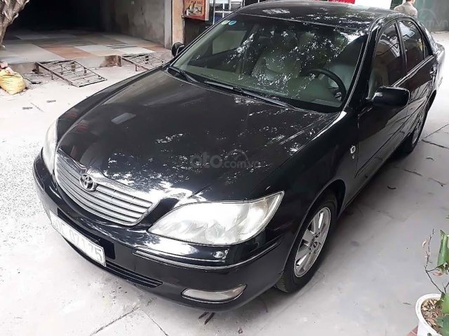 Cần bán xe Toyota Camry đời 2003, màu đen xe máy chạy êm