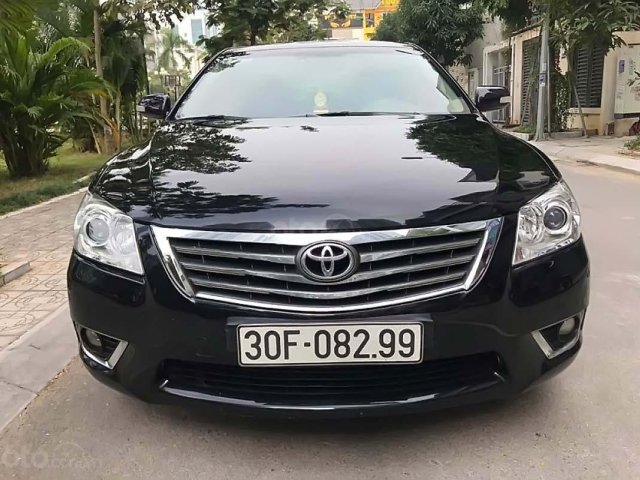 Cần bán xe Toyota Camry 2.4G sản xuất 2010, màu đen số tự động0