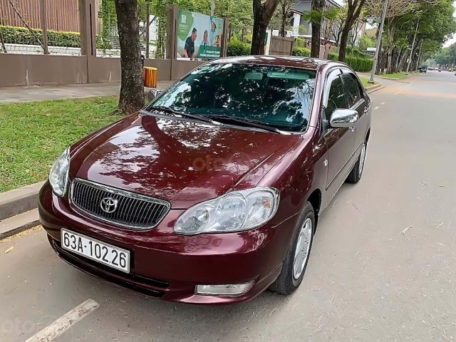 Cần bán gấp Toyota Corolla Altis năm 2004, màu đỏ số sàn, 295tr0