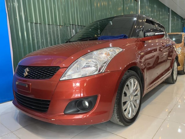 Bán ô tô Suzuki Swift 1.4AT Special sản xuất 2016, màu đỏ