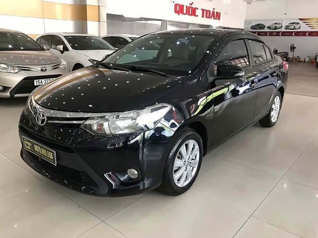 Cần bán xe cũ Toyota Vios 1.5E năm 2014, màu đen