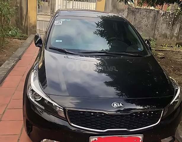 Cần bán xe cũ Kia Cerato AT đời 2016, màu đen0