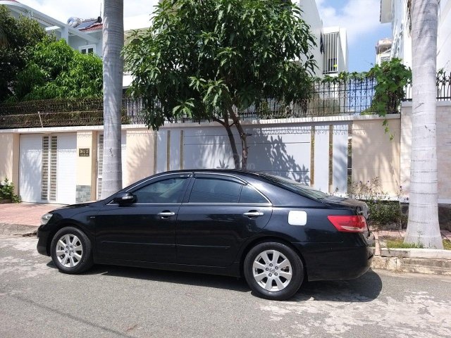 Bán gấp Toyota Camry 2.4G 2007, màu đen0