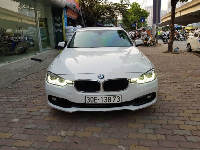 Cần bán BMW 320i năm sản xuất 2015, màu trắng, nhập khẩu