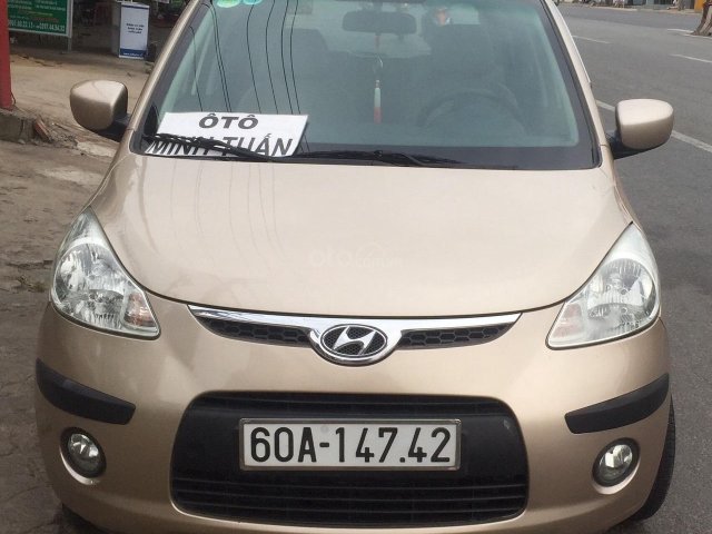 Hyundai i10 1.1 AT, số tự động, xe nhập khẩu Ấn Độ đời 2009, đăng kí 2010, màu vàng cát, xe zin đẹp0