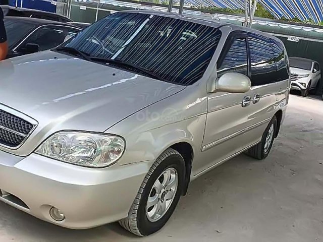 Bán xe cũ Kia Carnival GS 2.5 AT năm 2008, màu vàng, 225tr0