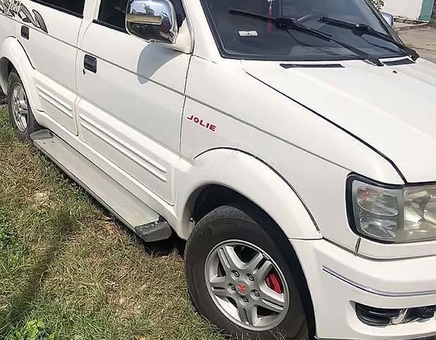 Cần bán gấp Mitsubishi Jolie sản xuất 2004, màu trắng số sàn, xe còn mới lắm