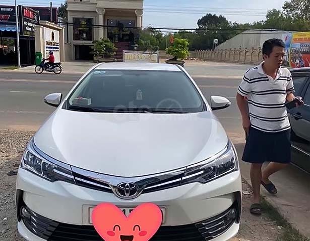 Cần bán xe Toyota Corolla Altis năm sản xuất 2019, màu trắng xe còn mới nguyên0