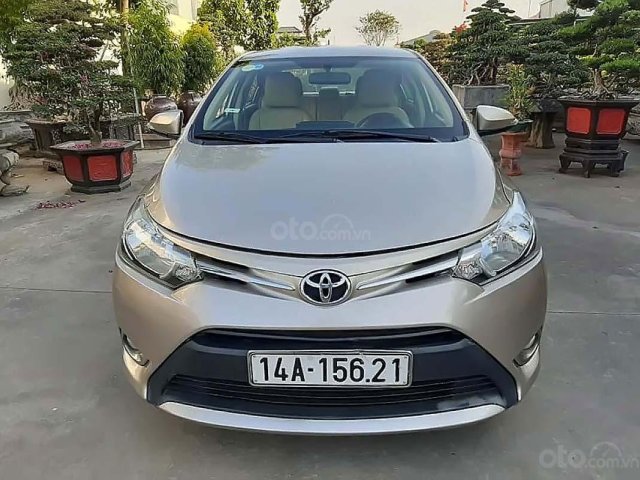 Cần bán lại xe Toyota Vios E năm 2015, màu vàng, 398tr0