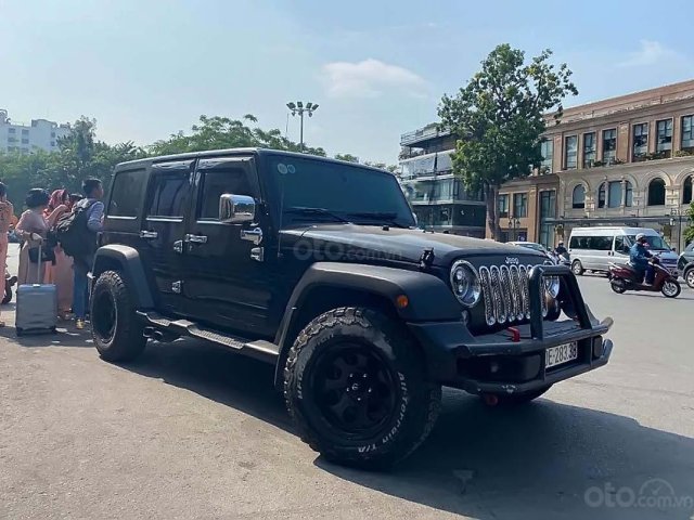 Bán Jeep Wrangler Unlimited Sport 3.6 AT sản xuất 2015, màu đen, xe nhập0