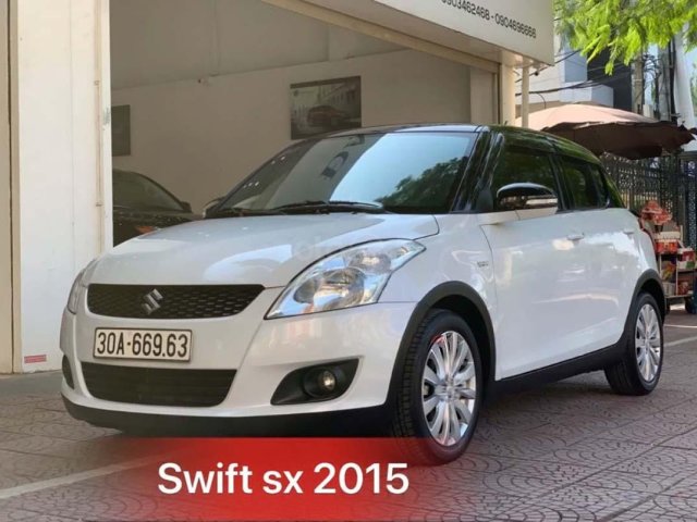 Bán Suzuki Swift 1.4 AT đời 2015, màu trắng, chính chủ