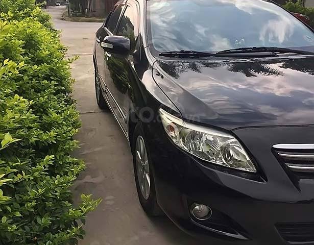 Bán Toyota Corolla Altis năm sản xuất 2010, màu đen, số tự động0