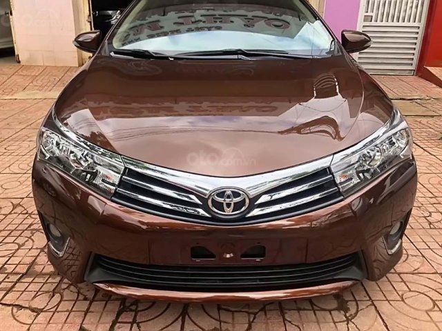 Cần bán Toyota Corolla Altis 1.8G MT năm sản xuất 2015, màu nâu, 550tr