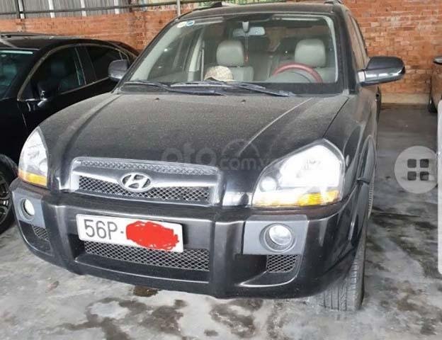 Bán xe Hyundai Tucson 2.0 AT 4WD đời 2009, màu đen, xe nhập chính hãng0