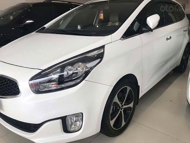 Cần bán Kia Rondo GAT 2.0AT đời 2016, màu trắng số tự động0