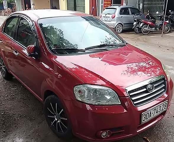 Bán ô tô Daewoo Gentra 2009, màu đỏ số sàn, xe còn mới lắm