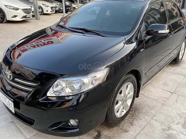 Bán ô tô Toyota Corolla Altis 1.8G MT năm 2010, màu đen  0