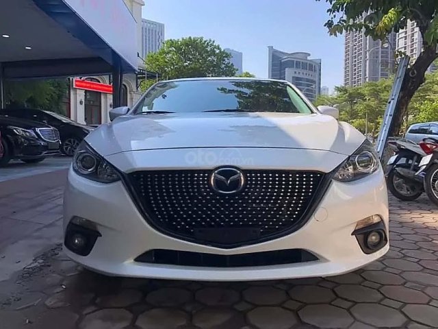 Bán ô tô Mazda 3 1.5 AT sản xuất năm 2015, màu trắng, giá tốt0