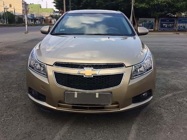 Cần bán Chevrolet Cruze đời 2014, màu vàng, giá tốt0