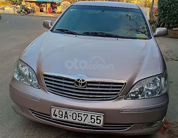 Cần bán lại xe Toyota Camry đời 2003, màu hồng0