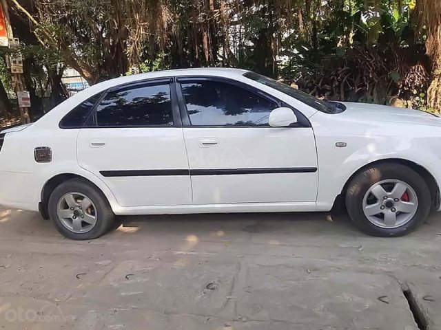 Cần bán gấp Daewoo Lacetti EX 1.6 MT năm 2004, màu trắng0