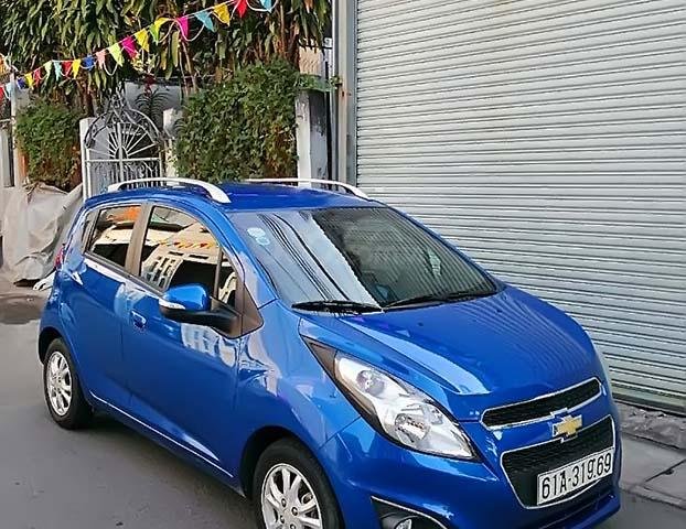 Cần bán gấp Chevrolet Spark LT 1.2 MT đời 2016, màu xanh lam