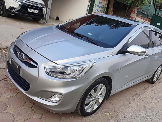 Cần bán xe Hyundai Accent 1.4 AT 2013, màu bạc, nhập khẩu nguyên chiếc0