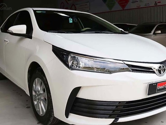 Cần bán Toyota Corolla Altis 1.8E MT đời 2018, màu trắng giá cạnh tranh