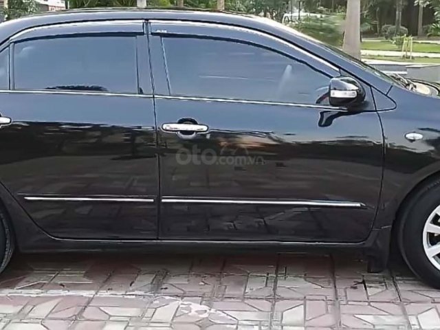 Cần bán Toyota Corolla XLi 1.6 AT sản xuất 2009, màu đen, xe nhập, giá tốt0