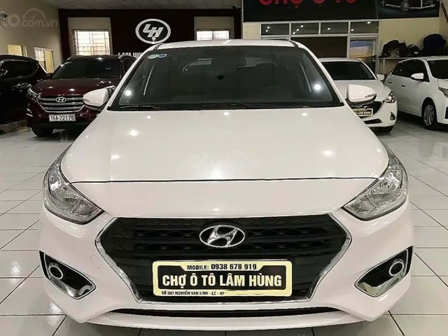 Cần bán gấp Hyundai Accent 1.4 MT Base đời 2019, màu trắng 0