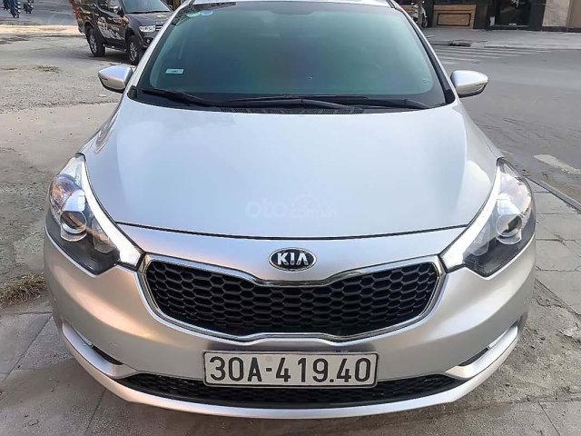 Cần bán lại xe Kia K3 1.6 AT sản xuất 2015, màu bạc số tự động xe còn mới lắm0