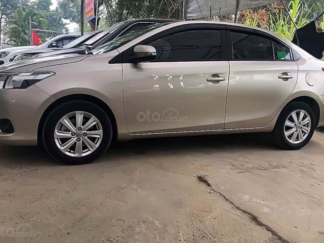 Xe Toyota Vios 1.5E sản xuất năm 2017, màu vàng0