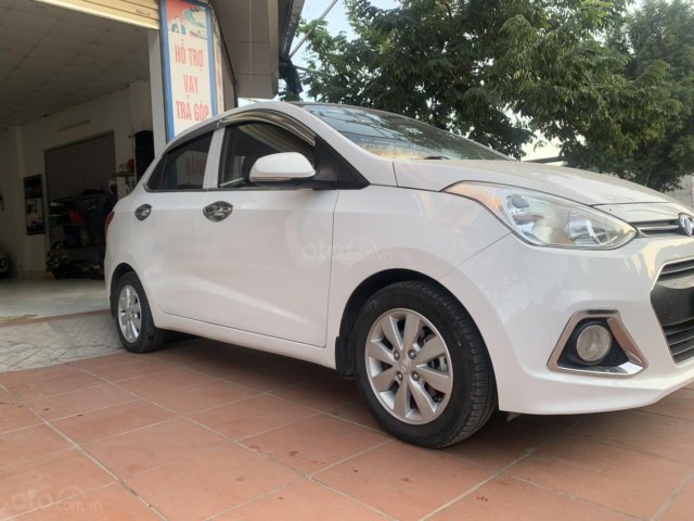 Bán Hyundai Grand i10 sản xuất năm 2015, bản đủ, màu trắng0