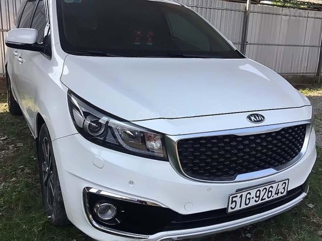 Cần bán lại xe Kia Sedona đời 2016, màu trắng xe còn mới lắm0