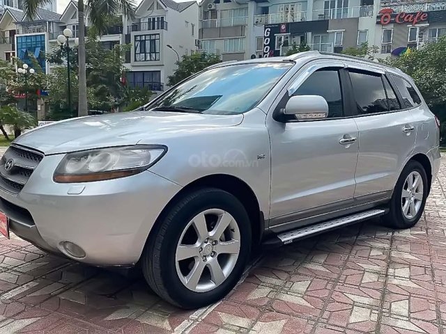 Bán Hyundai Santa Fe SLX đời 2009, màu bạc, nhập khẩu, 555tr