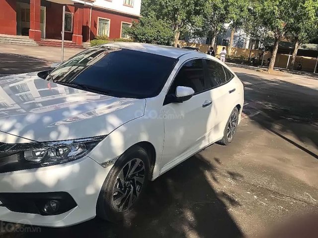 Cần bán lại xe Honda Civic 1.8 E đời 2018, màu trắng, xe nhập 0