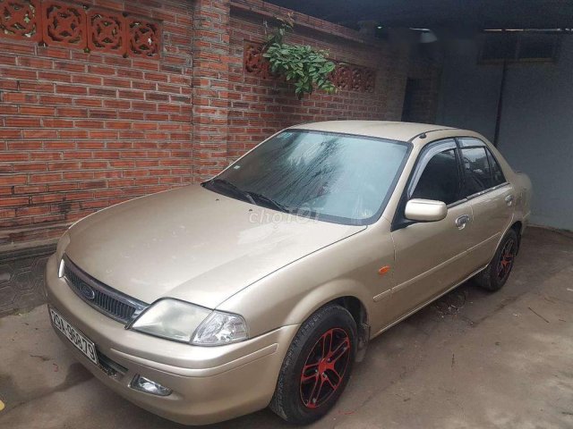 Bán Ford Laser 2002, màu vàng, xe nhập