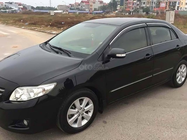 Bán Toyota Corolla Altis 1.8G MT sản xuất năm 2009, màu đen, giá tốt0