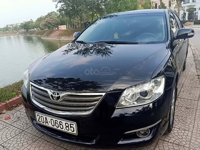 Cần bán Toyota Camry 2.4 năm sản xuất 2007, màu đen0